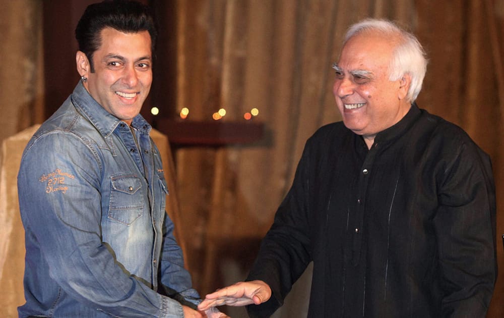 Union Law and IT Minister Kapil Sibal and actor Salman Khan at the launch of AR Rahman's music album 'Raunaq' in Mumbai. Sibal wrote lyrics for the seven songs in the album.