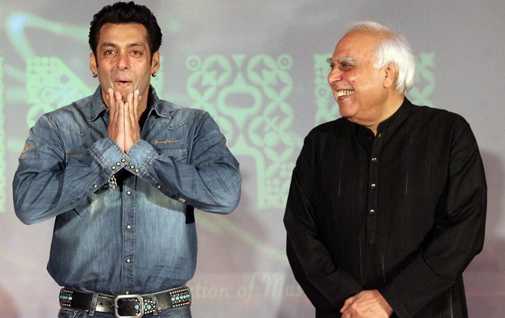 Union Law and IT Minister Kapil Sibal and actor Salman Khan at the launch of AR Rahman's music album 'Raunaq' in Mumbai. Sibal wrote lyrics for the seven songs in the album.