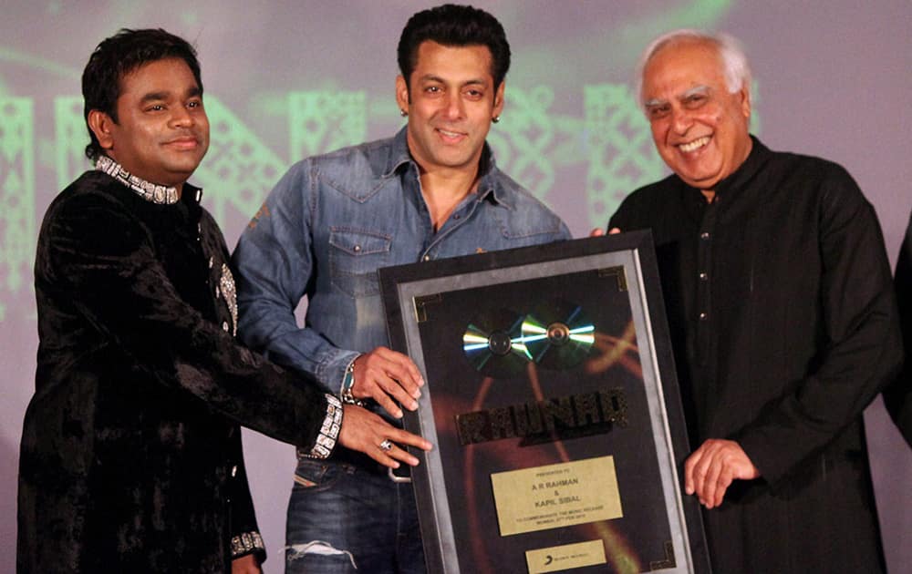 Union Law and IT Minister Kapil Sibal, actor Salman Khan and music composer A R Rahman at the launch of the latter's music album 'Raunaq' in Mumbai. Sibal wrote lyrics for the seven songs in the album.