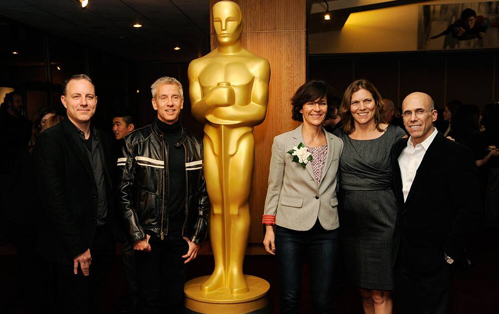 Kirk DeMicco and Chris Sanders, co-directors of the Oscar-nominated animated feature film 'The Croods,' pose at a reception featuring the Oscar nominees in the Animated Feature Film category in Beverly Hills, Calif.