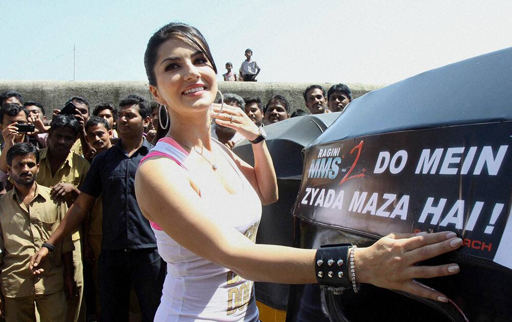 Sunny Leone at rickshaw branding campaign to promote her film Ragini MMS 2 in Mumbai.