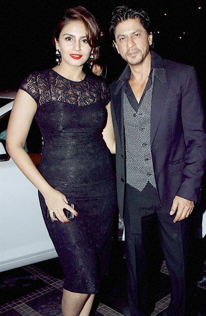 Bollywood actor Shahrukh Khan with actress Humaa Qureshi during a party in Mumbai.