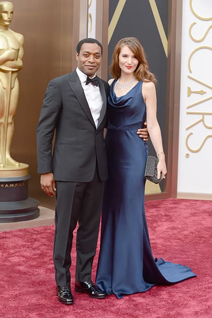 Chiwetel Ejiofor and Sari Mercer arrive at the Oscars, at the Dolby Theatre in Los Angeles.