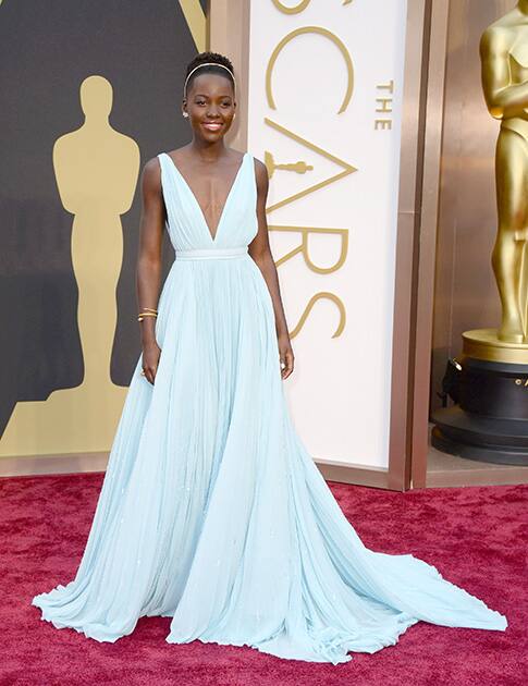 Lupita Nyong'o arrives at the Oscars, at the Dolby Theatre in Los Angeles.