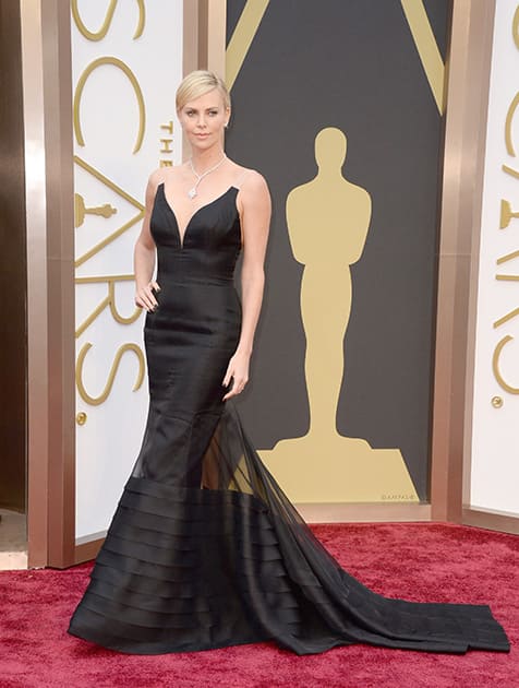 Charlize Theron arrives at the Oscars, at the Dolby Theatre in Los Angeles.