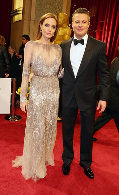 Angelina Jolie and Brad Pitt arrive at the Oscars, at the Dolby Theatre in Los Angeles.