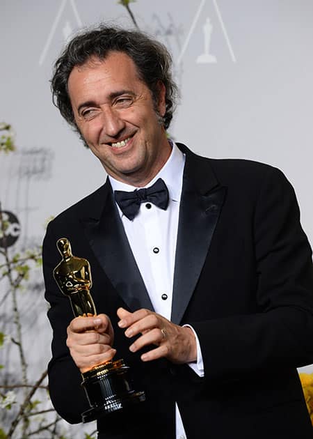 Paolo Sorrentino poses in the press room with the award for best foreign language film of the year for 'The Great Beauty' during the Oscars at the Dolby Theatre, in Los Angeles.