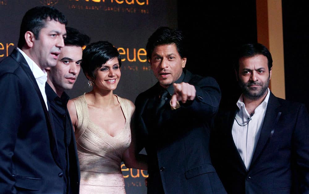 Brand ambassador Shah Rukh Khan unveiled Tag Heuer's Golden Carrera collection with directors Kunal Kohli, Tarun Mansukhani, Punit Malhotra and actress Mandira Bedi in Mumbai.