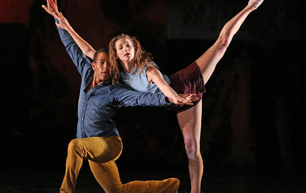 American dancers Anthony Bryant, left, and Rachelle Rafailedes perform on the stage of the Chatelet theatre in Paris, as part of the L.A.