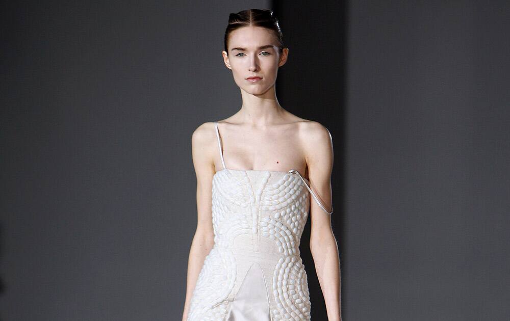 A model wears a creation as part of Iris Van Herpen's ready-to-wear fall/winter 2014-2015 fashion collection presented in Paris.