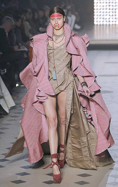 A model presents a creation as part of Vivienne Westwood's ready-to-wear fall/winter 2014-2015 fashion collection presented in Paris.