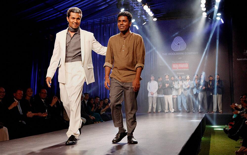 Randeep Hooda walks the ramp at a fashion event in New Delhi.