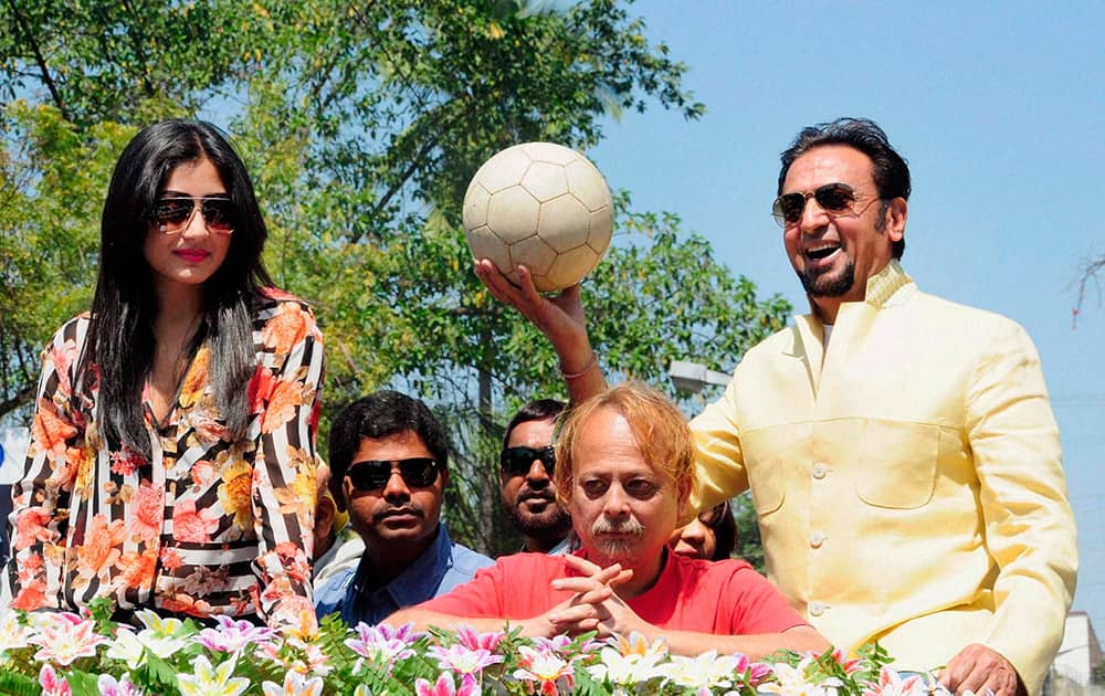 Gulshan Grover and Rimi Sen during a football tournament in Malda.