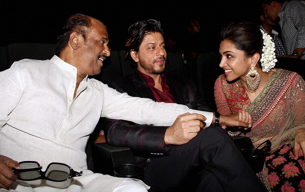 Bollywood stars Rajinikanth, Shahrukh Khan and Deepika Padukone at the music release function of Rajinikanth's latest movie Kochadaiiyaan in Chennai.