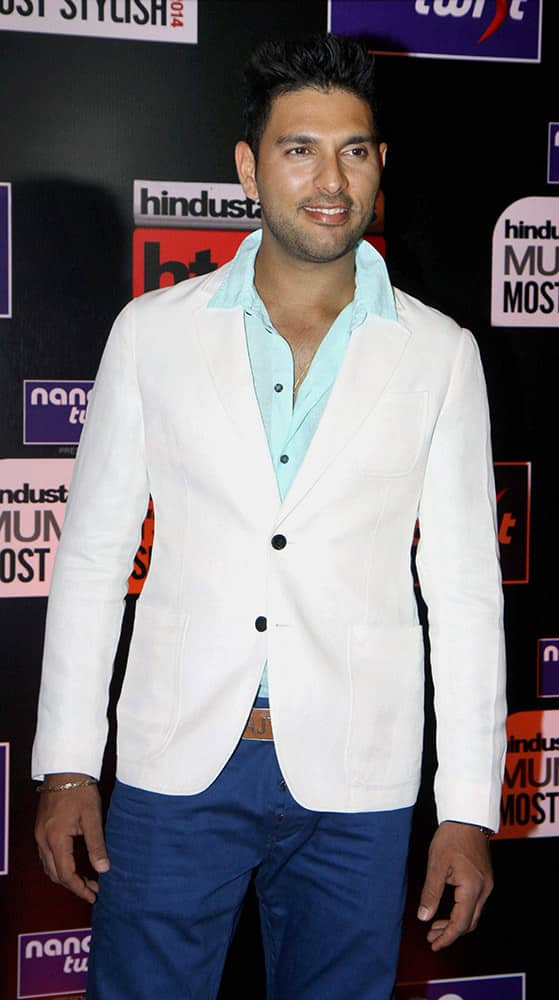 Indian cricketer Yuvraj Singh poses during an Awards function in Mumbai.