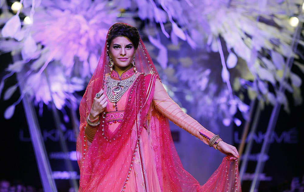 Bollywood actress Jacqueline Fernandez walks the ramp to showcase a creation by Tarun Tahiliani during the Lakme Fashion Week in Mumbai.