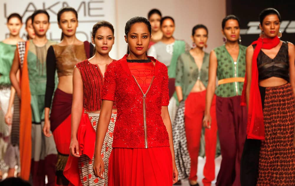 Models walk the ramp to showcase creations by Sougat Paul during the Lakme Fashion Week in Mumbai.