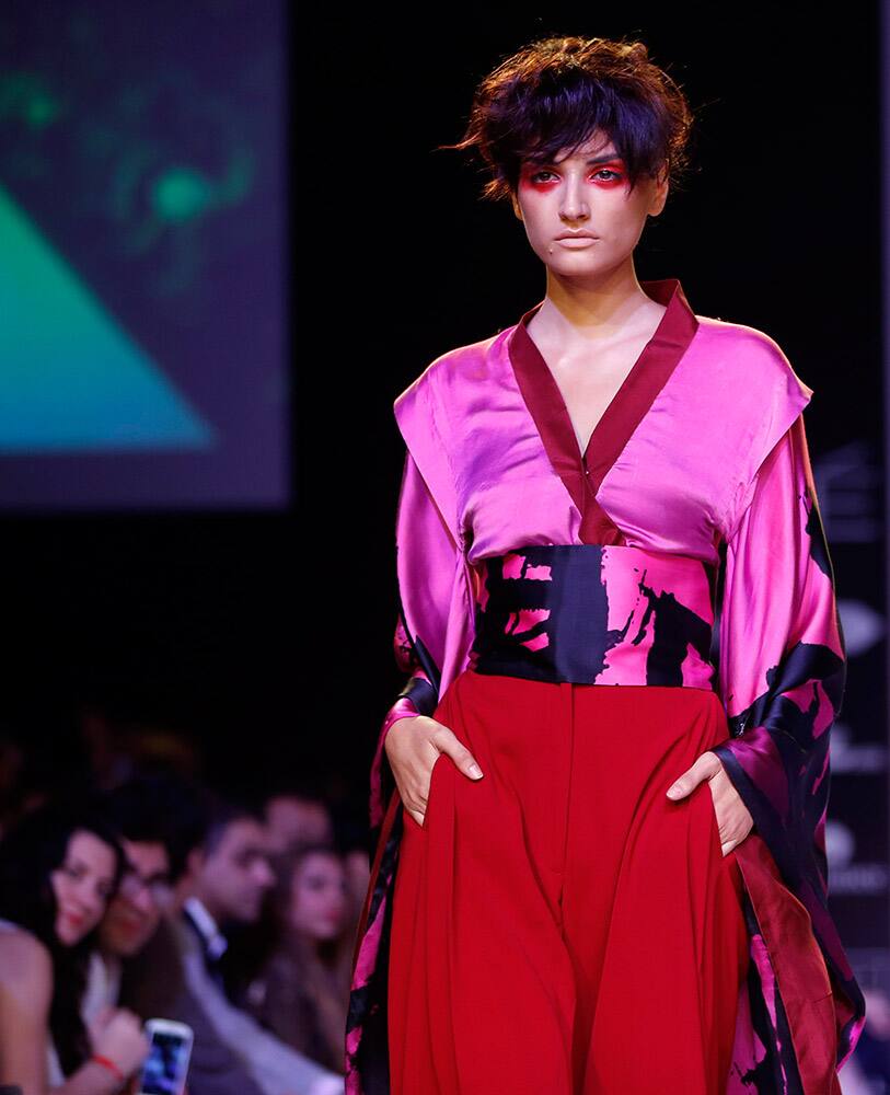 A model displays creation by Narendra Kumar during the Lakme Fashion Week in Mumbai.