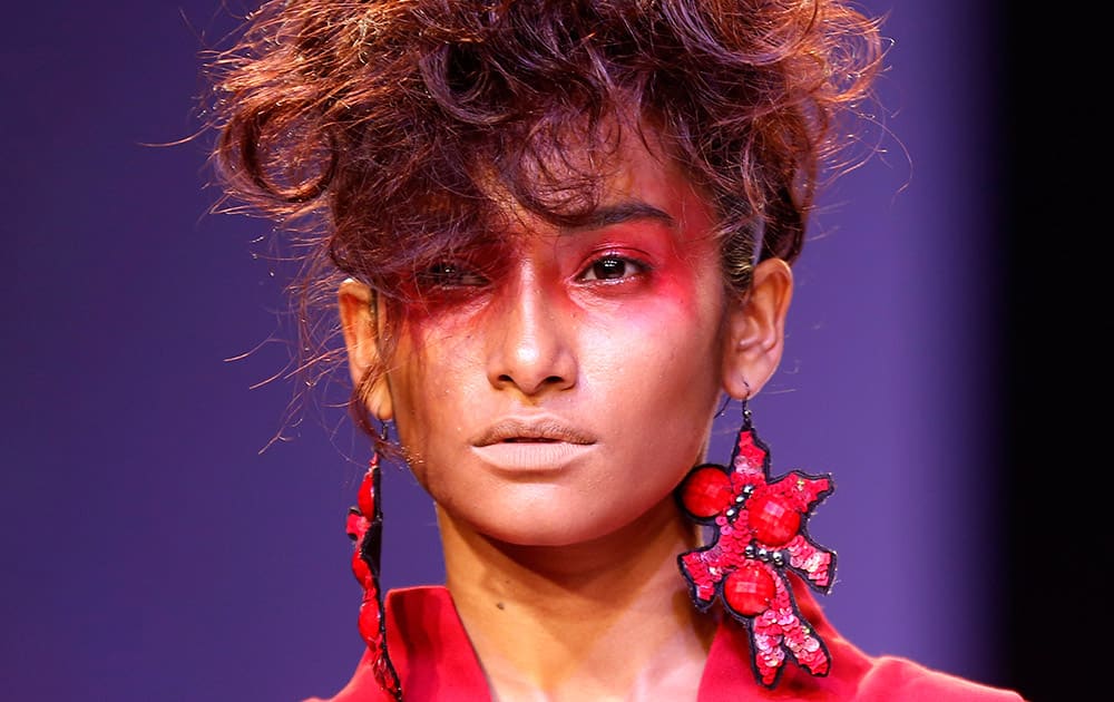 A model displays a creation by Narendra Kumar during the Lakme Fashion Week in Mumbai.