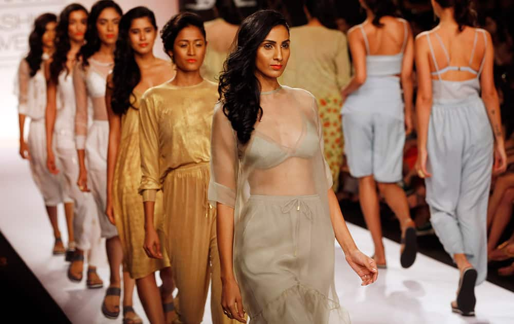 Models walk the ramp to showcase creations by Nishka Lulla during the Lakme Fashion Week in Mumbai.