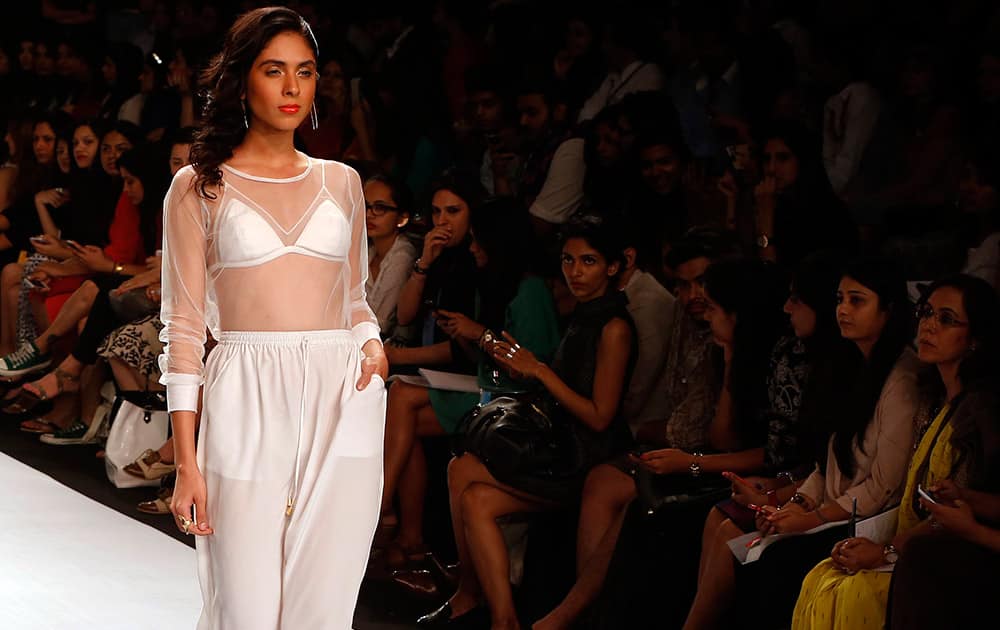 A model walks the ramp to showcase a creation by Nishka Lulla during the Lakme Fashion Week in Mumbai.