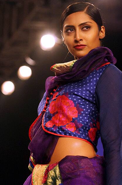 Model walks the ramp during a fashion show at Lakme Fashion Week 2014, in Mumbai.