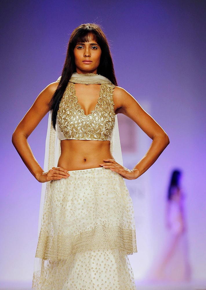 A model displays a creation by designer Shehla Khan during the Lakme Fashion Week