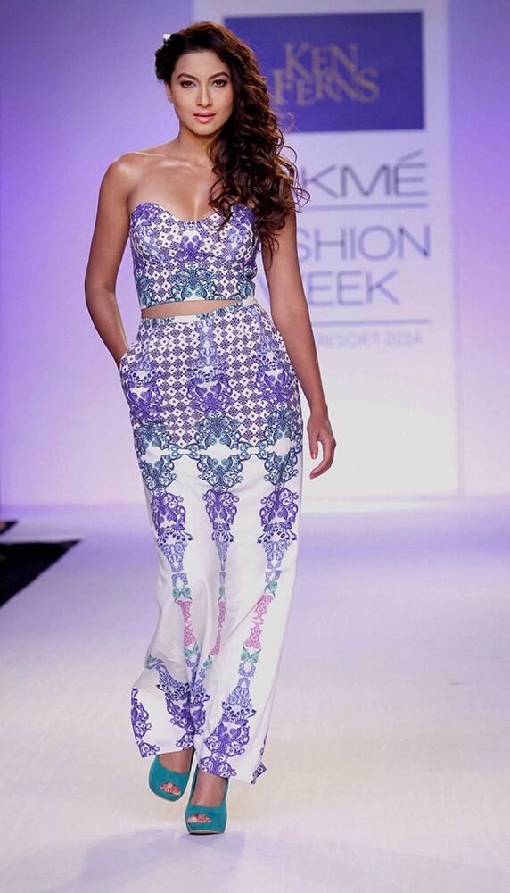 Bollywood actor Gauhar Khan walks the ramp during the Lakme Fashion Week 2014, in Mumbai.