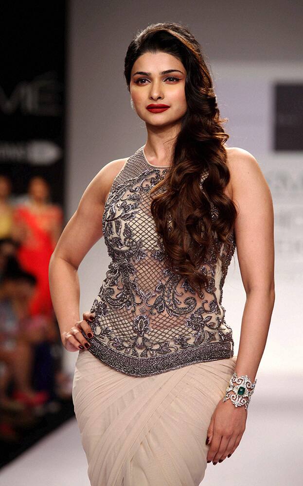 Bollywood actor Prachi Desai walks the ramp during the Lakme Fashion Week 2014, in Mumbai.