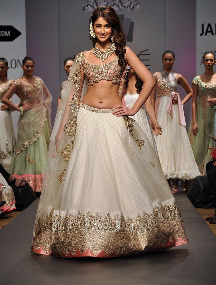 Bollywood actress Ileana D'Cruz walks the ramp for designer Anushree Reddy during the Lakme Fashion Week (LFW)2014 in Mumbai.