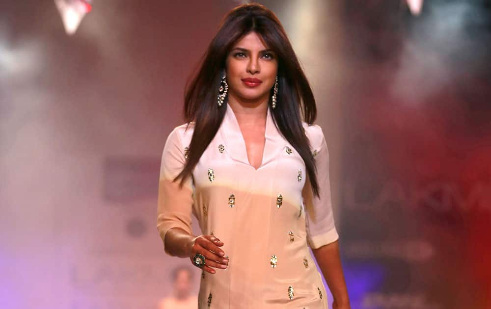 Bollywood actress Priyanka Chopra displays a creation by Neeta Lulla during the Lakme Fashion Week in Mumbai.