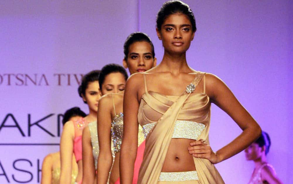 Models walk the ramp during the Lakme Fashion Week 2014 in Mumbai.