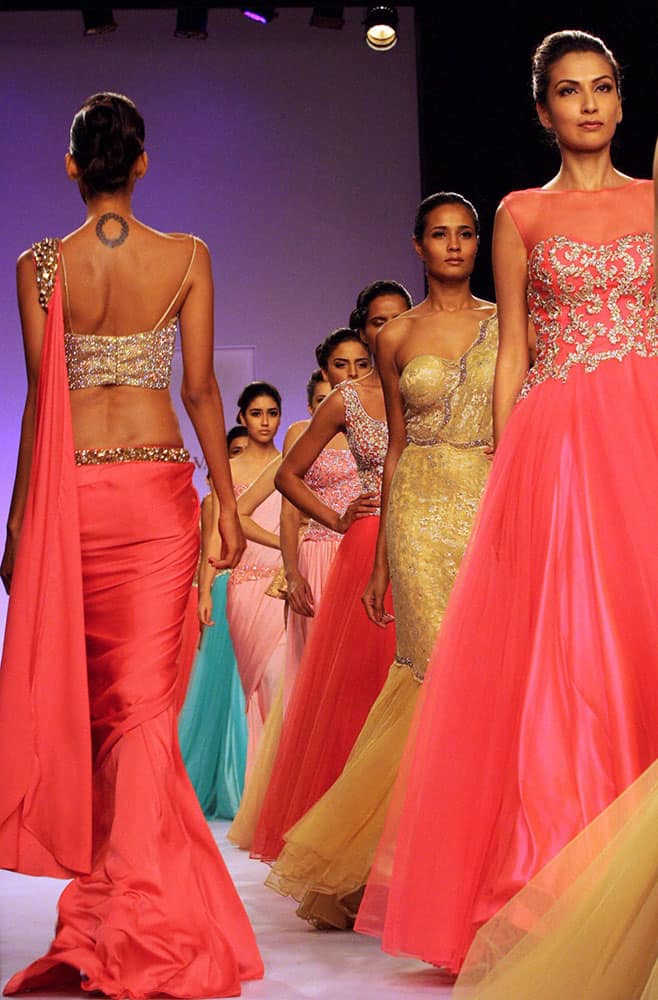 Models walk the ramp during the Lakme Fashion Week 2014 in Mumbai.