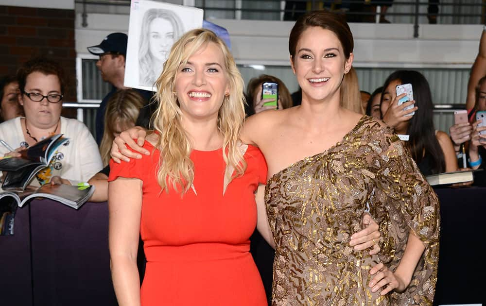 Kate Winslet and Shailene Woodley arrive at the world premiere of `Divergent` at the Westwood Regency Village Theater Los Angeles. 