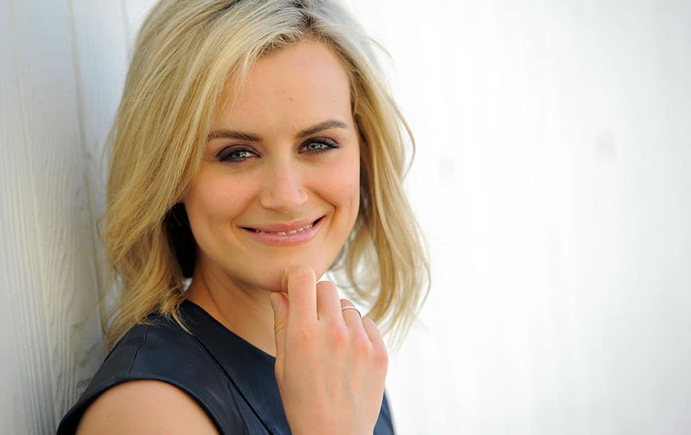 Actress Taylor Schilling poses for a portrait in Los Angeles. Schilling stars as Piper Chapman in the Lionsgate television series, `Orange Is the New Black.`