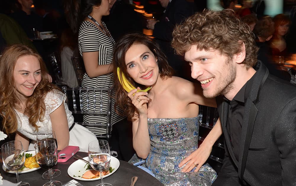 Actress Carice van Houten, center, and friends attend HBO's `Game of Thrones` fourth season premiere after party at the Museum of Natural History in New York. 