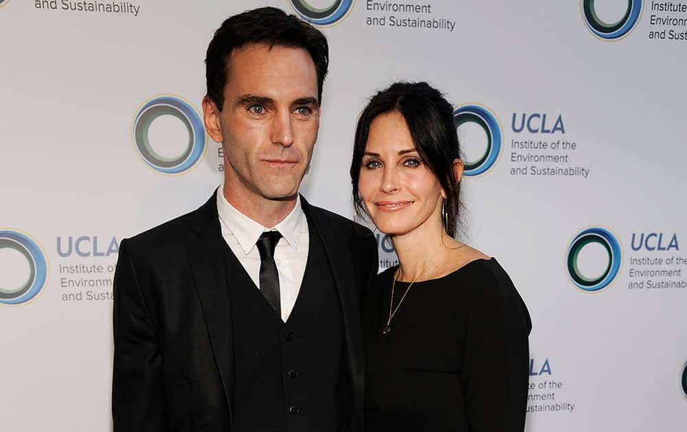 Actress Courteney Cox and boyfriend Johnny McDaid arrive together at the UCLA Institute of the Environment and Sustainability's An Evening of Environmental Excellence in Beverly Hills, Calif. 