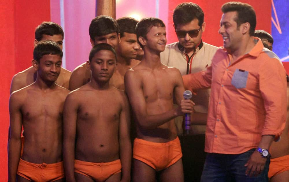 Bollywood actor Salman Khan with blind boys, who performed ancient game malkhamb at an event in Mumbai.