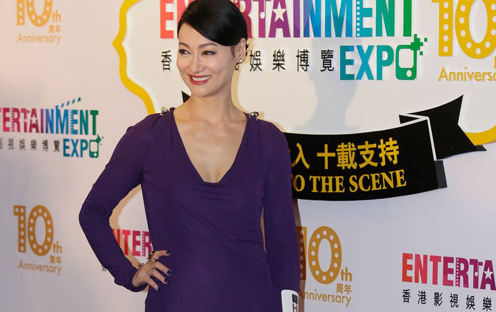 Hong Kong actress Kara Hui poses for the photographers at the red carpet of 38th Hong Kong International Film Festival (HKIFF) Grand Opening.