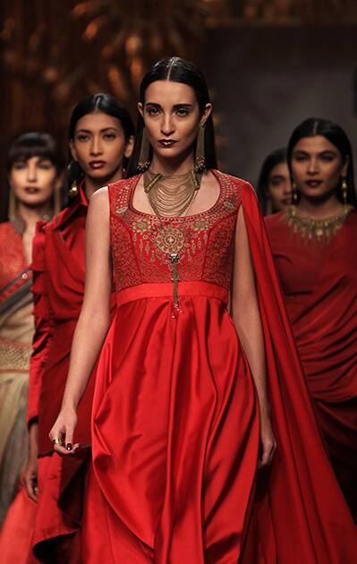 Models display creations by Tarun Tahiliani during the Wills lifestyle Fashion Week in New Delhi.