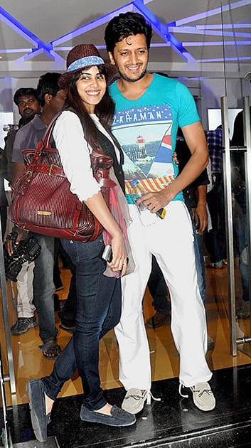 Bollywood actors Genelia Deshmukh and Ritesh Deshmukh during the special screening of the Tamil film.