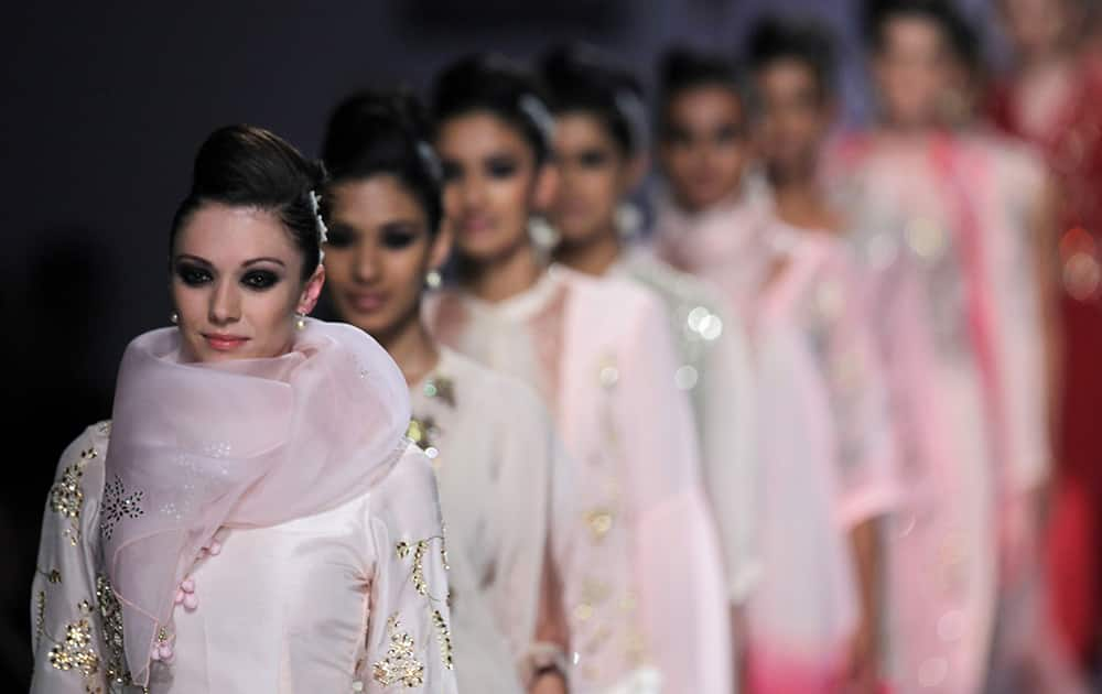 Models display creations by Nikasha during the Wills Lifestyle Fashion Week in New Delhi.