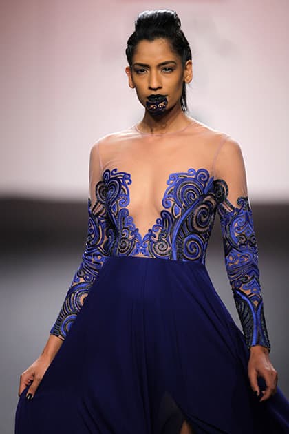 A model wears a creation by Nachiket Barve during the Wills Lifestyle Fashion Week in New Delhi.