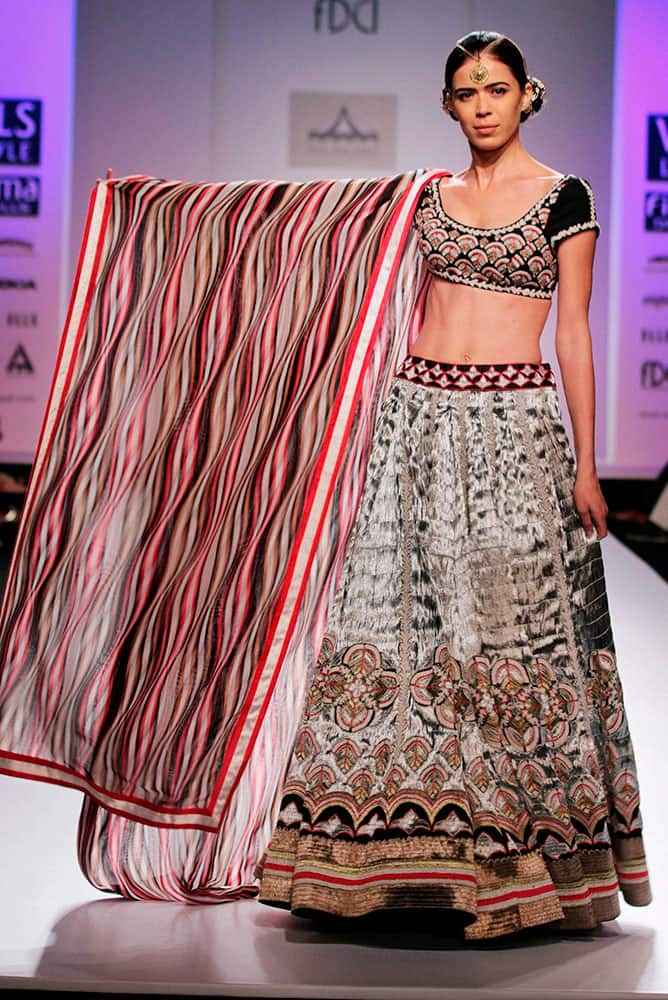  A model displays a creation by Pia during the Wills Lifestyle Fashion Week in New Delhi.