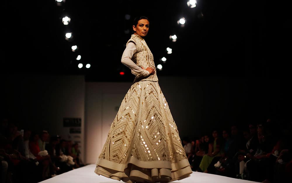 A model displays a creation by Sahil Kochhar, during the Wills Lifestyle India Fashion Week in New Delhi.