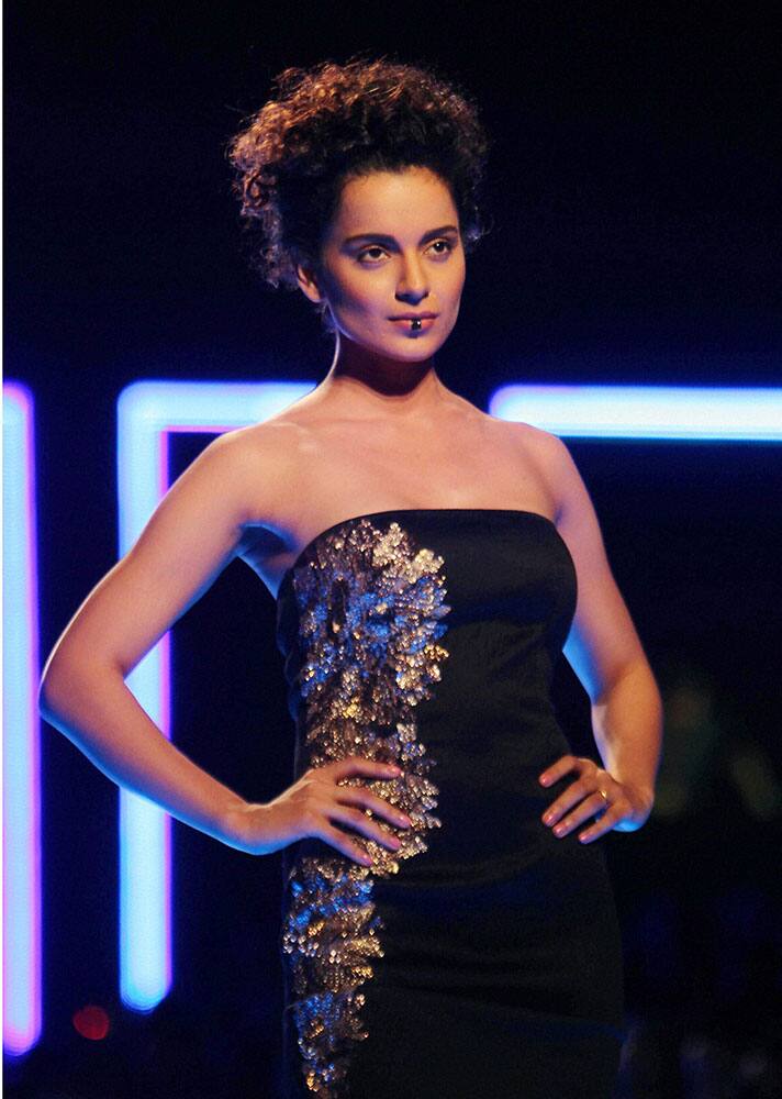 Bollywood actor Kangana Ranaut display a creation by Namrata Jaoshipura during the Grand Finale of Wills lifestyle Fashion Week in New Delhi.