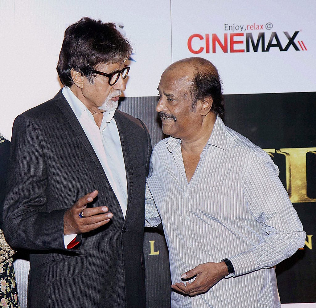 Bollywood actors Rajijnikanth and Amitabh Bachchan during the curtain raiser of film Kochadaiiyaan in Mumbai.