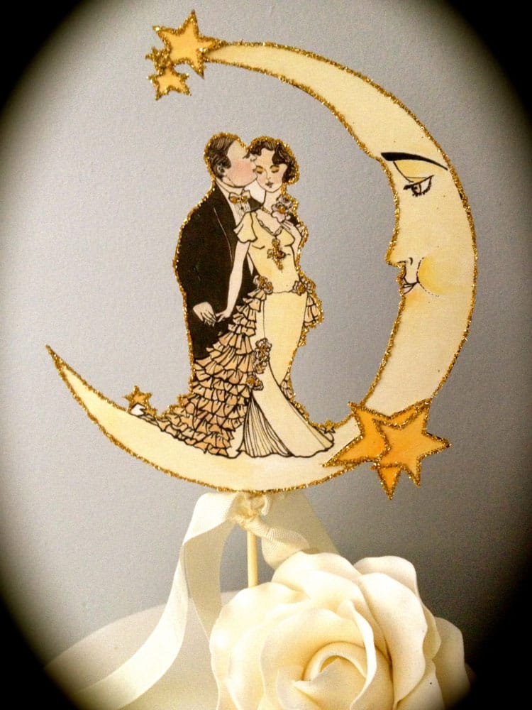 This photo provided by Jolie En Rose Vintage shows illustrator and designer Kris Shoemaker's 1920s style paper embellishments as a cake topper that she created for a vintage style wedding.