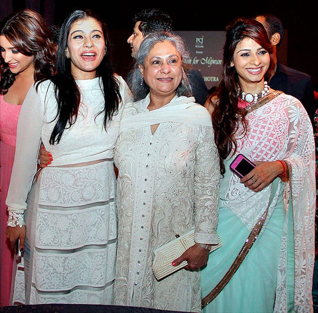 Bollywood actress Kajol Devgan, Jaya Bachchan and Tanisha poses for a photograph during a charity fashion show in Mumbai.