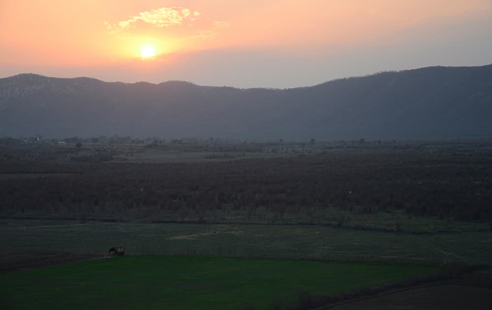 Catching the setting sun into the valley that runs through the Aravallis